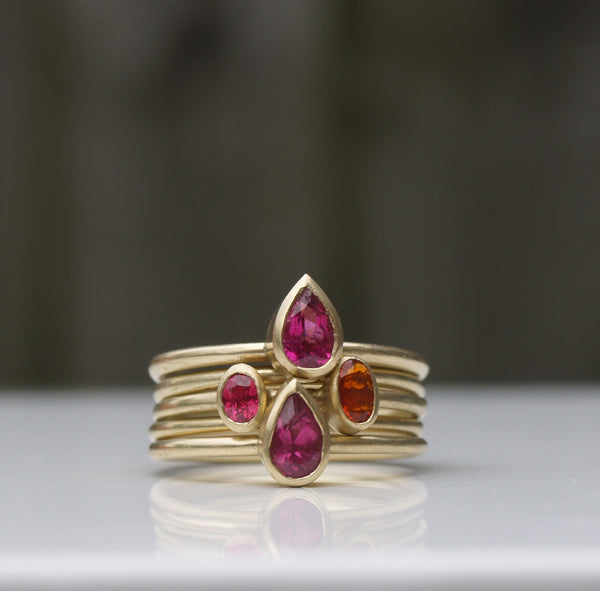 18ct recycled gold rubelite and fire opal stack set