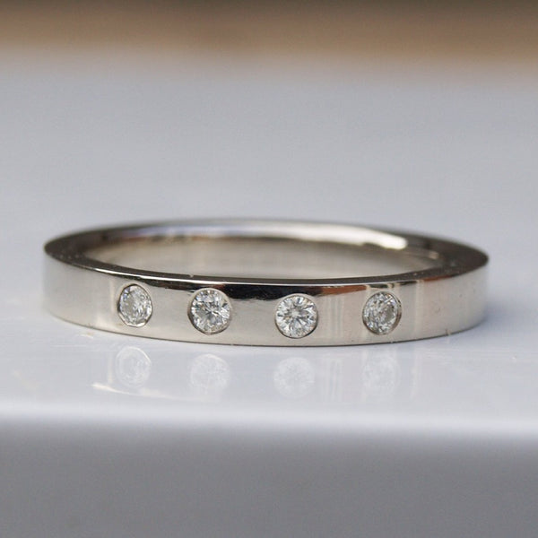14ct recycled white gold moissanite band