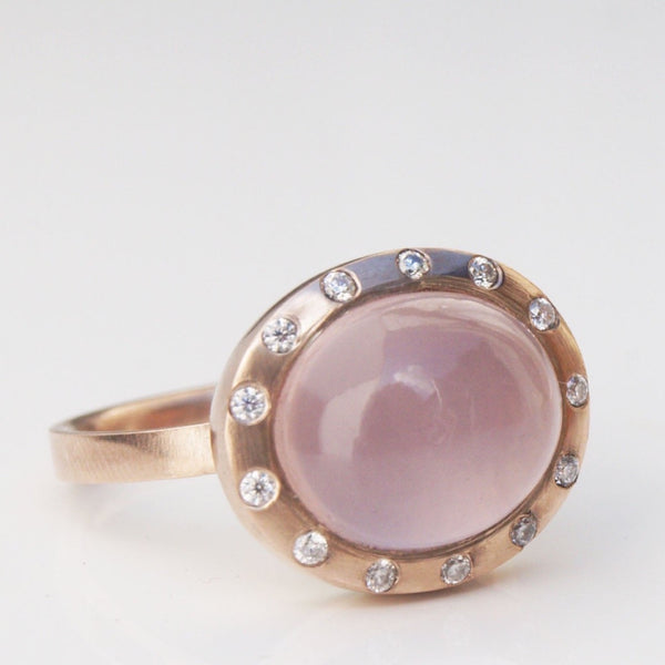 Traceable rose quartz cabochon ring in recycled rose gold