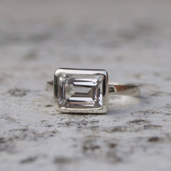 9ct recycled white gold ring with a white topaz