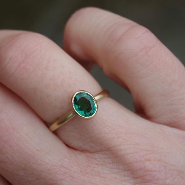 Oval emerald ring in recycled 18ct gold