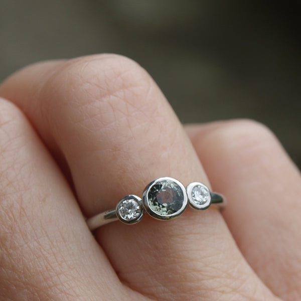Green sapphire and diamond ring in platinum