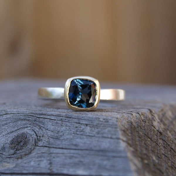 London blue topaz ring in silver and gold