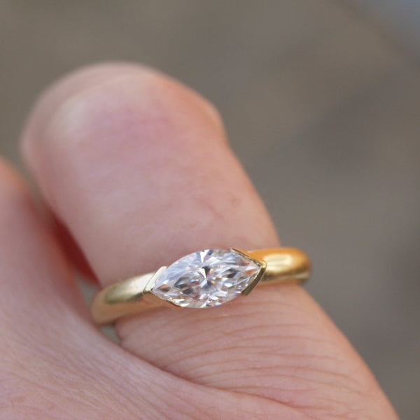 Marquise moissanite ring set in recycled 18ct yellow gold