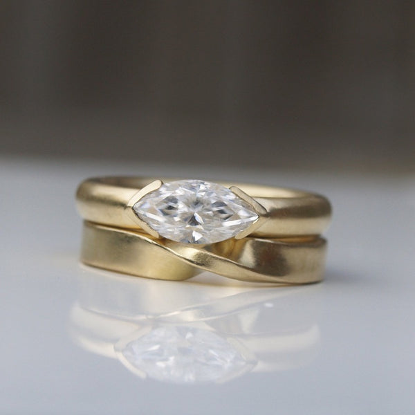 Marquise moissanite ring set in recycled 18ct yellow gold
