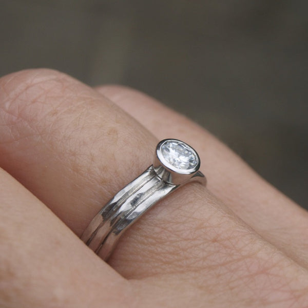 Recycled platinum and moissanite ring
