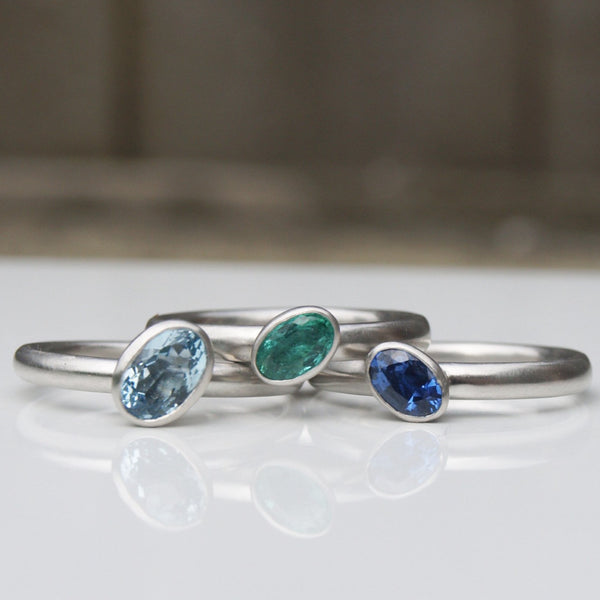 Platinum three band set with sapphire, emerald and aquamarine