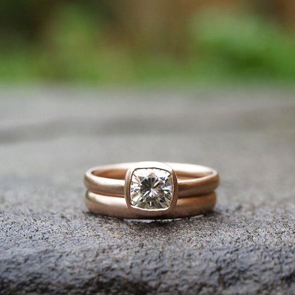 1ct Forever One moissanite ring set in recycled rose gold