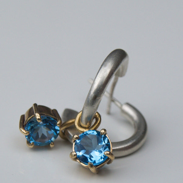 Silver and gold blue topaz hoop earrings