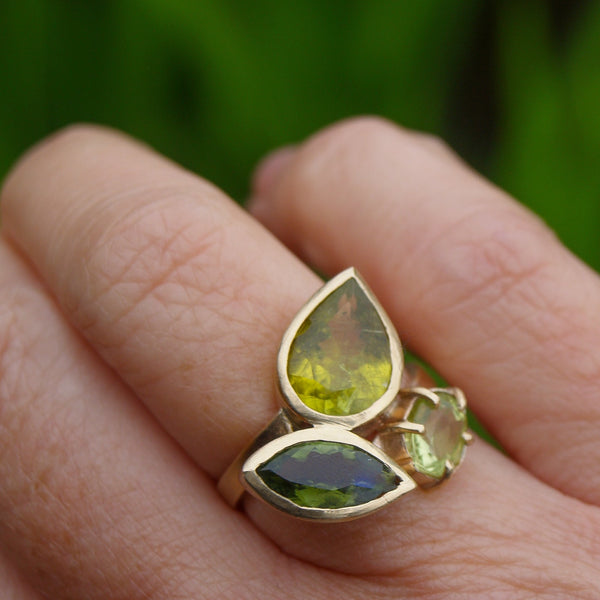 Green tourmaline and peridot three stone ring