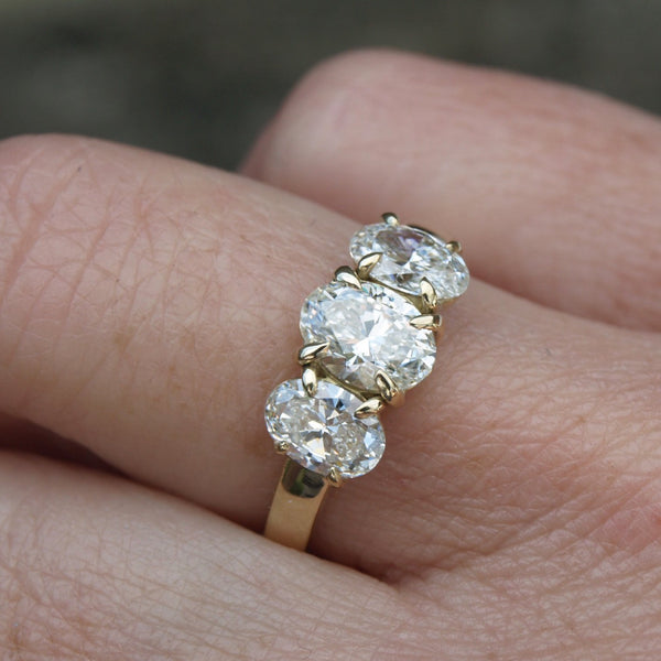 2ct oval diamond trilogy ring