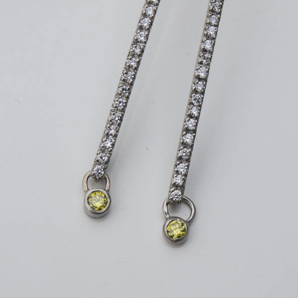 Diamond drop earrings in platinum