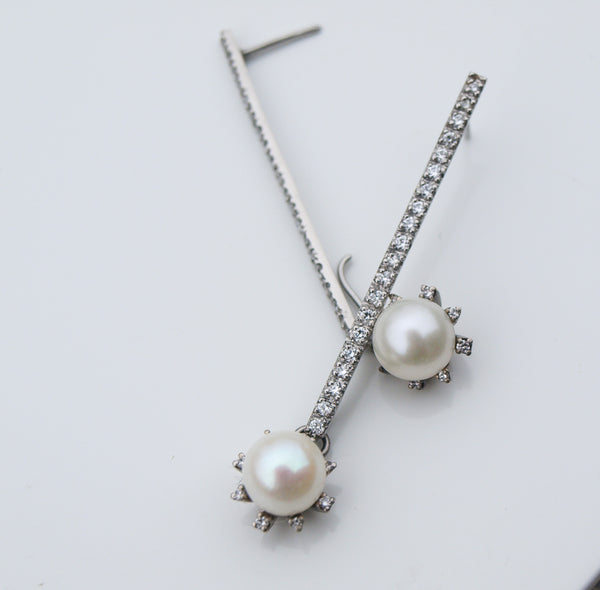Diamond drop earrings in platinum