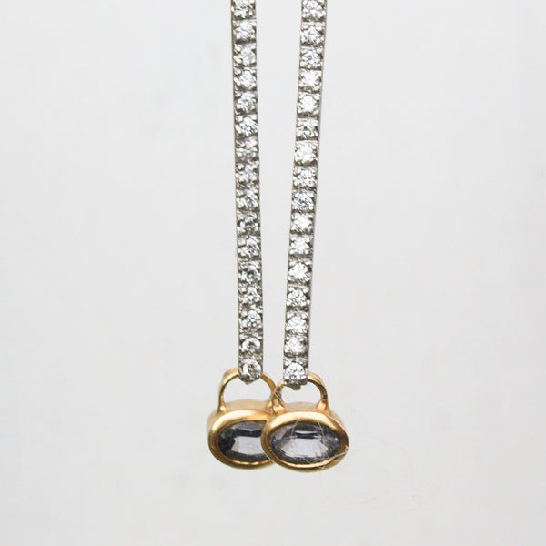 Diamond drop earrings in platinum