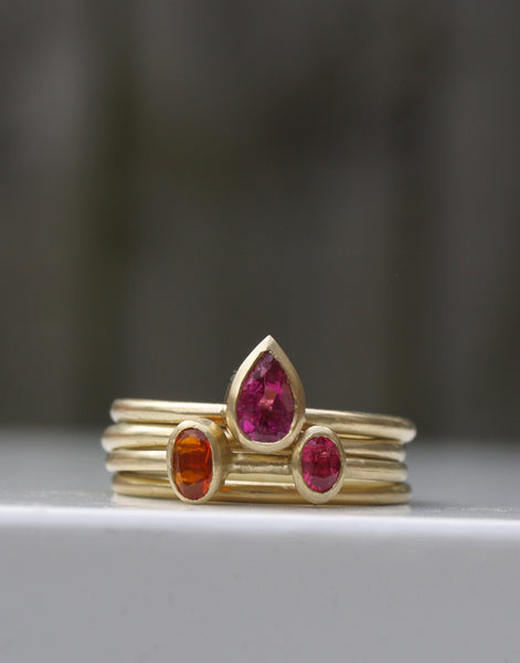 18ct recycled gold rubelite and fire opal stack set