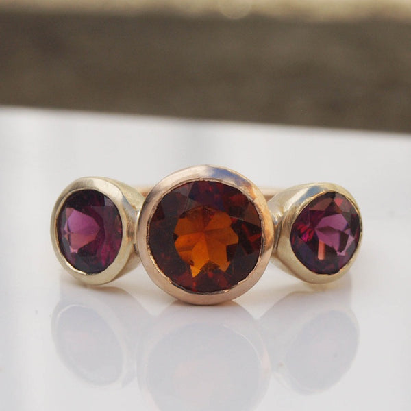 Garnet trilogy ring