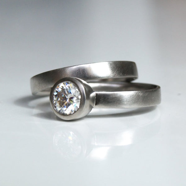Forever One moissanite ring set in platinum