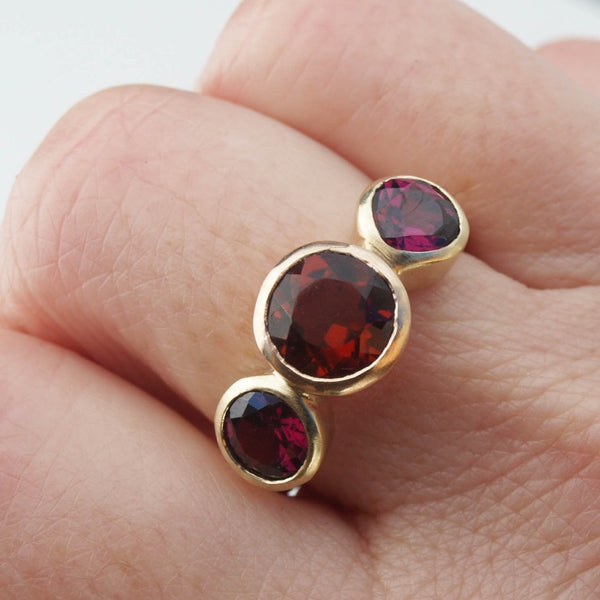 Garnet trilogy ring