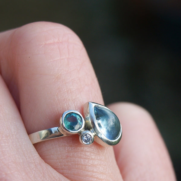 Aquamarine, emerald and diamond ring in recycled 9ct white gold