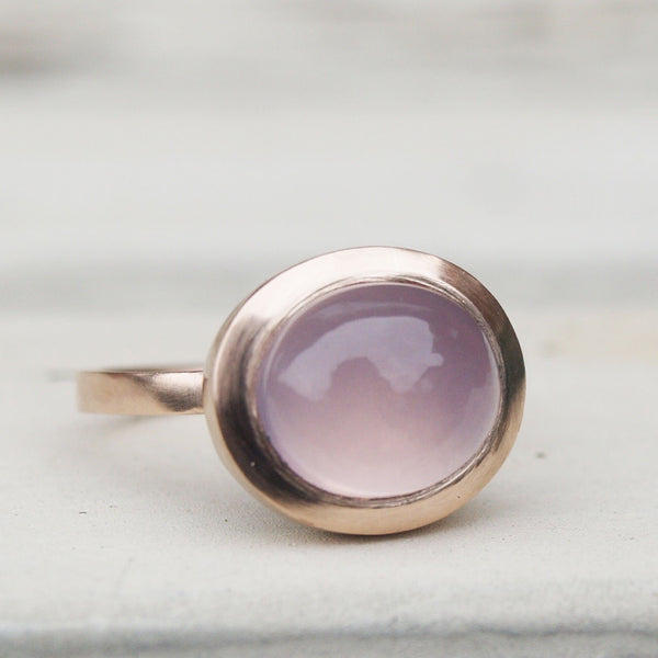 Traceable rose quartz cabochon ring in recycled rose gold