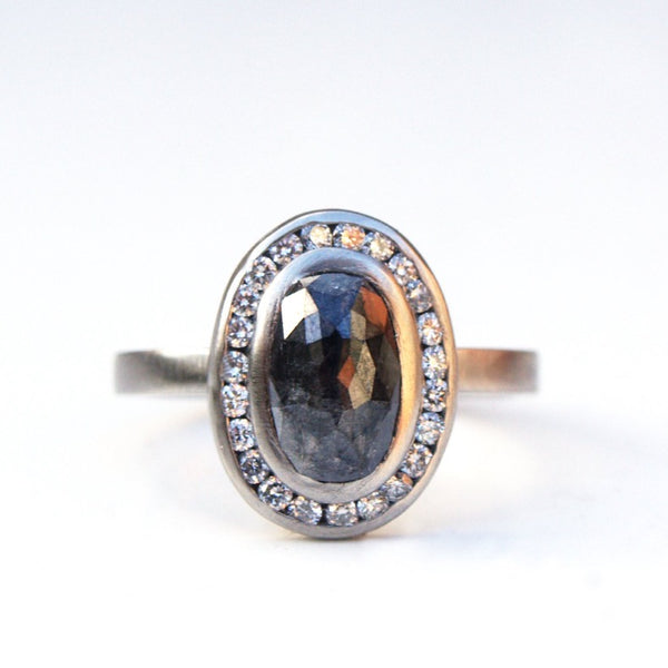 Black and white diamond halo ring
