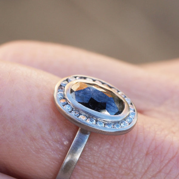 Black and white diamond halo ring