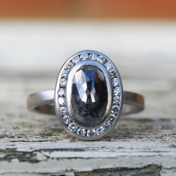 Black and white diamond halo ring