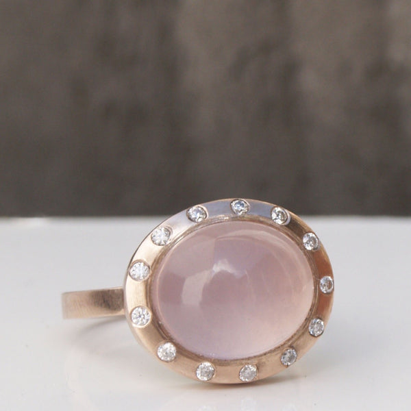 Traceable rose quartz cabochon ring in recycled rose gold