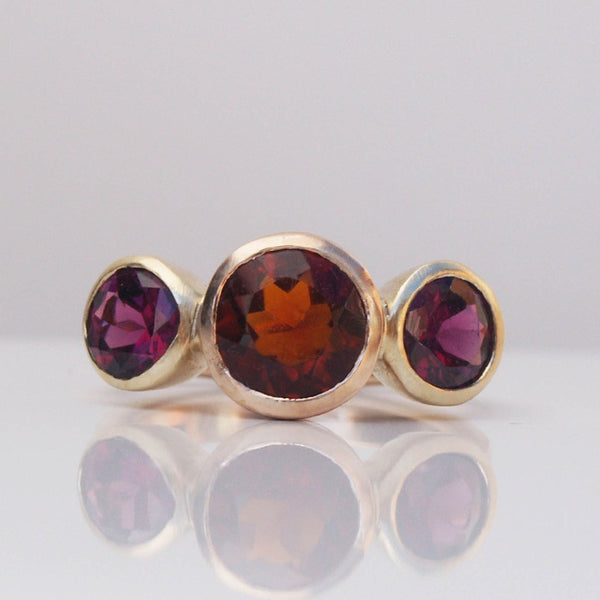 Garnet trilogy ring