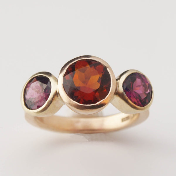 Garnet trilogy ring