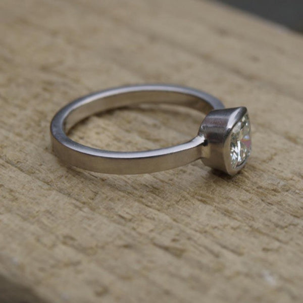 Forever One cushion cut  moissanite platinum ring
