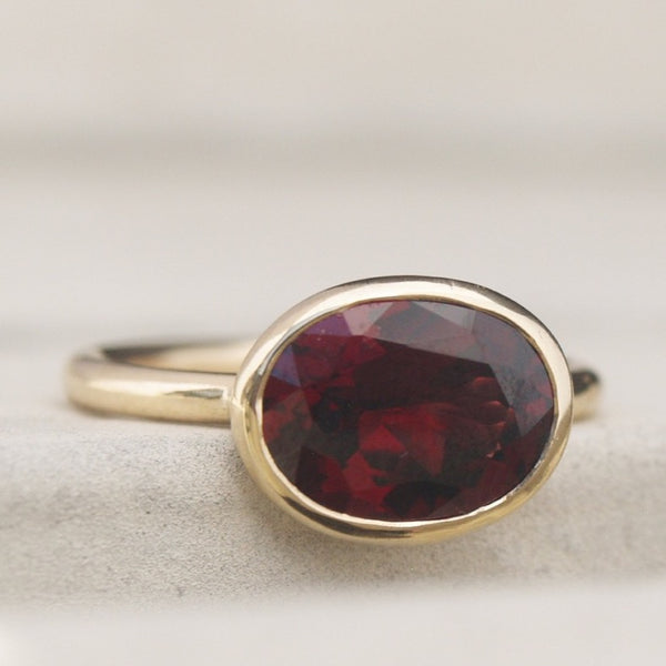 Garnet stacking ring in 9ct recycled gold