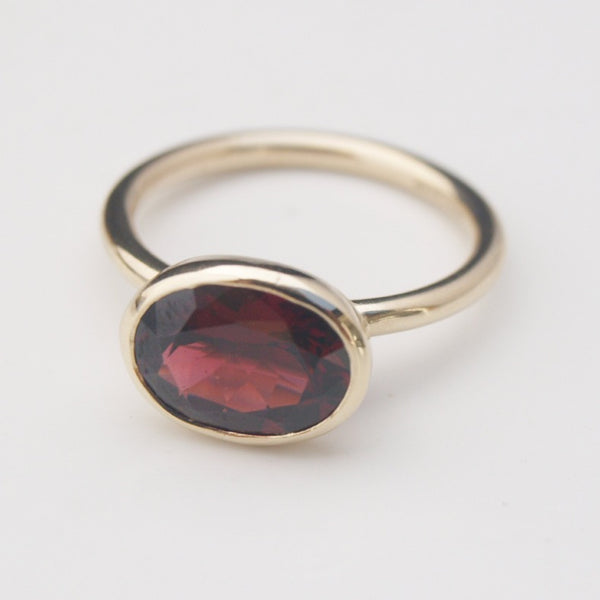 Garnet stacking ring in 9ct recycled gold