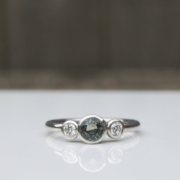 Green sapphire and diamond ring in platinum