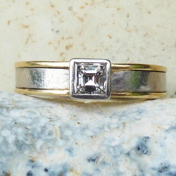 Platinum and 18ct ring with Carré cut diamond