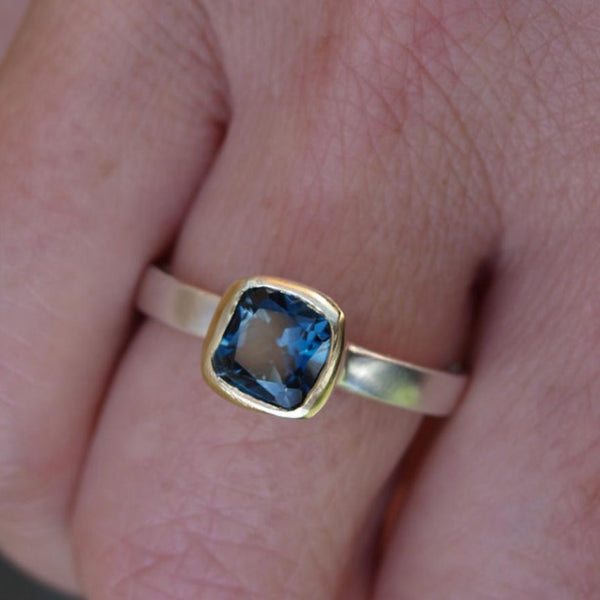 London blue topaz ring in silver and gold