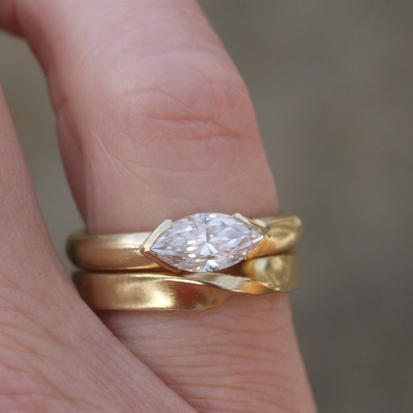 Marquise moissanite ring set in recycled 18ct yellow gold