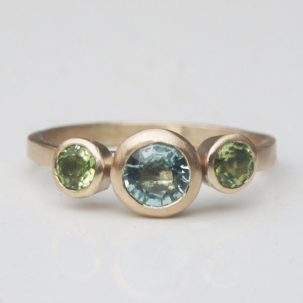 Green beryl and peridot trilogy ring