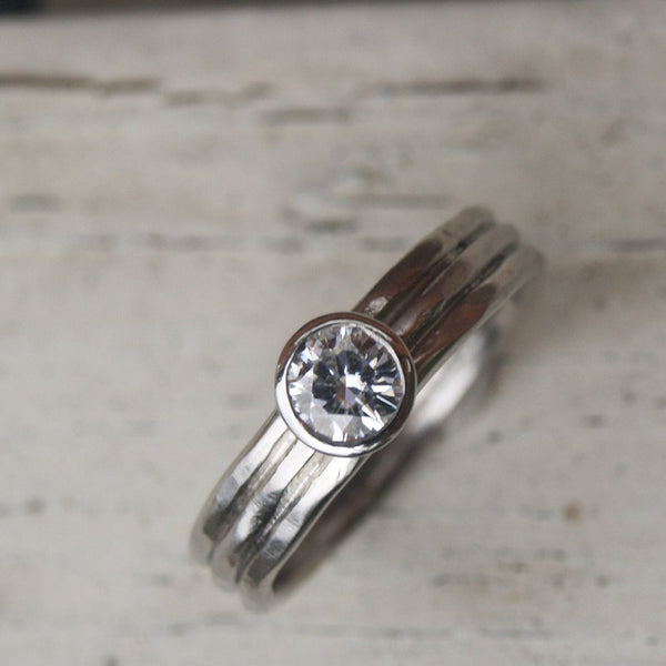 Recycled platinum and moissanite ring