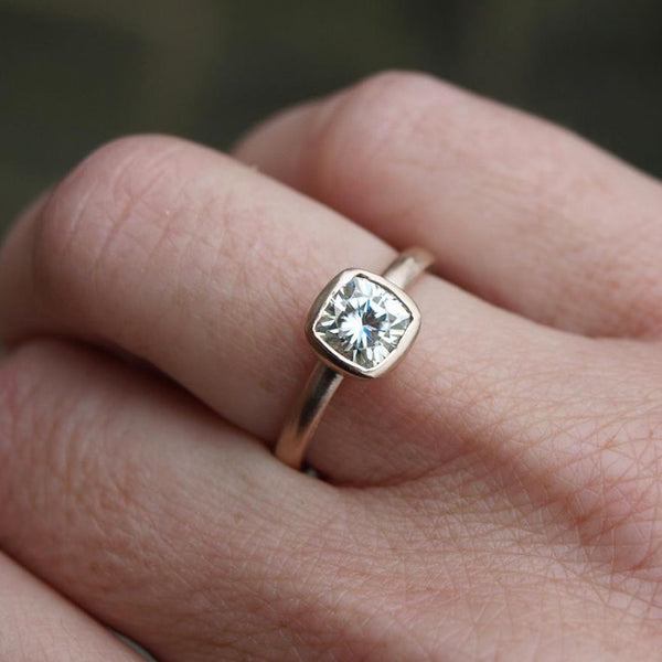 1ct Forever One moissanite ring set in recycled rose gold