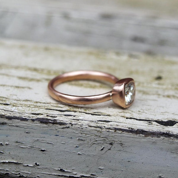 1ct Forever One moissanite ring set in recycled rose gold