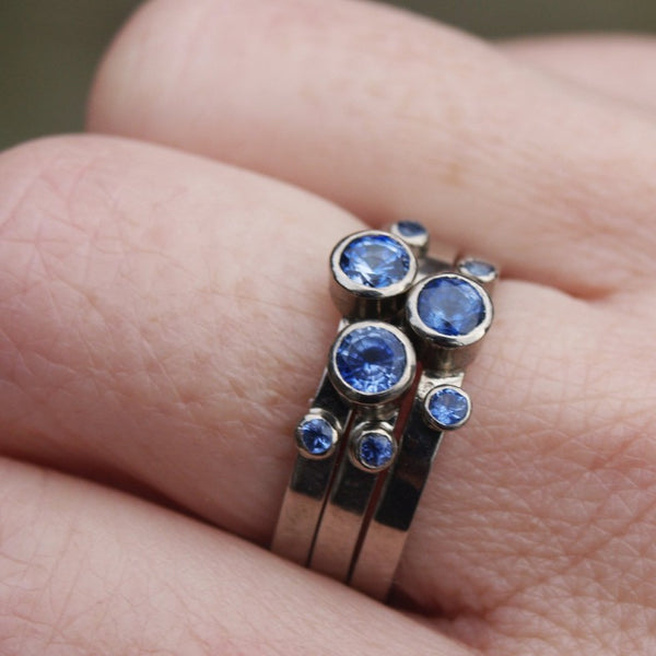 Sapphire stacking rings in recycled 18ct white gold