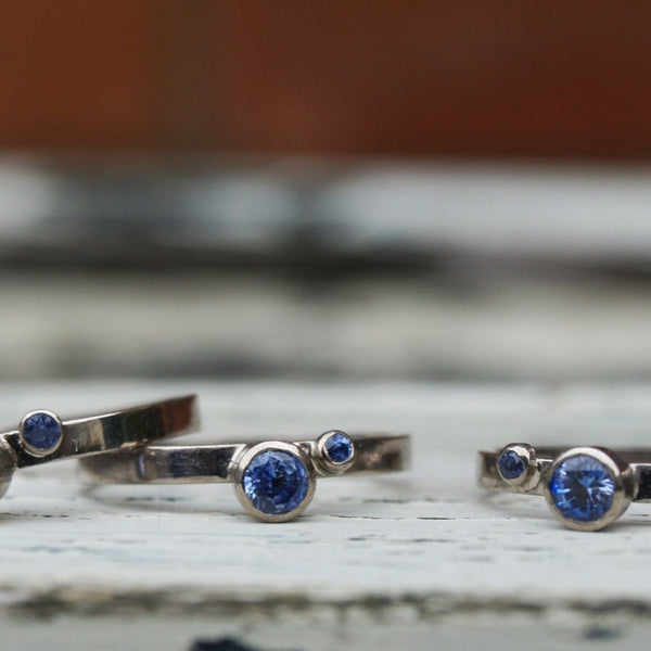 Sapphire stacking rings in recycled 18ct white gold