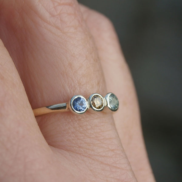 Sapphire and diamond three stone ring