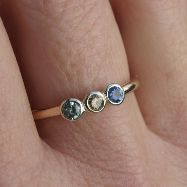 Sapphire and diamond three stone ring