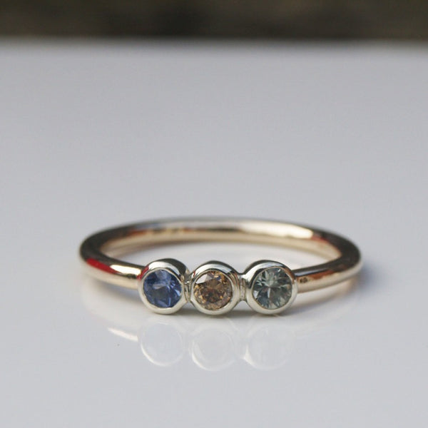 Sapphire and diamond three stone ring