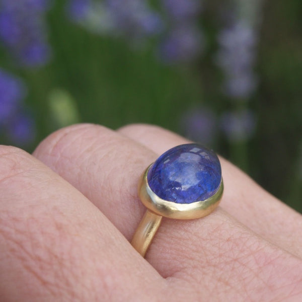 Cabachon tanzanite ring in recycled gold