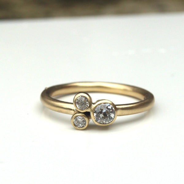 Three diamond ring in recycled 18ct gold