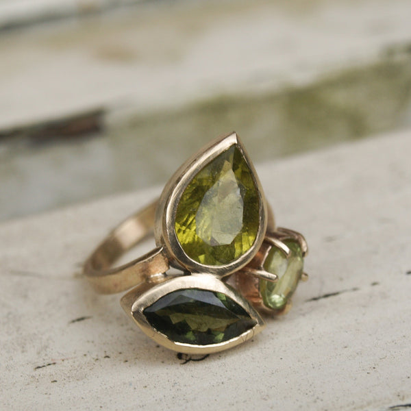 Green tourmaline and peridot three stone ring