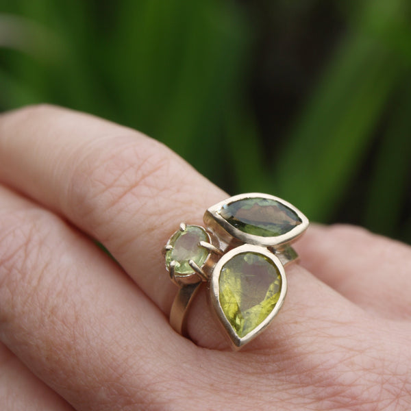 Green tourmaline and peridot three stone ring